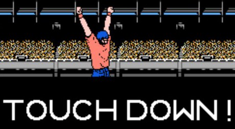 Scene from NES game; Quarterback celebrates touchdown in all his 8-bit glory