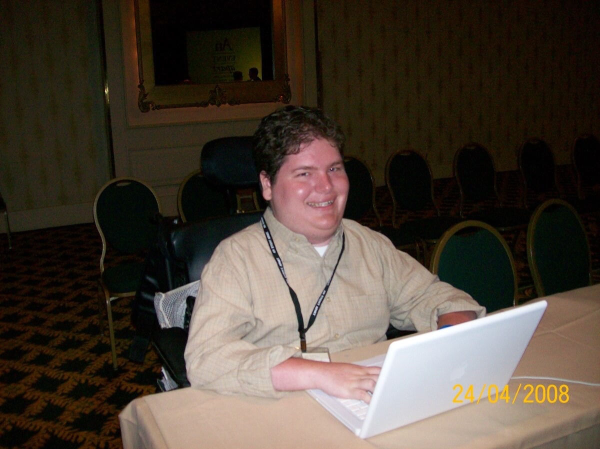 Me at An Event Apart, MacBook open and ready for the next talk to start.